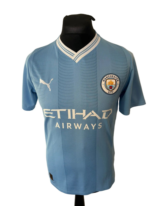 Manchester City 2023-24 home football shirt, blue, small, Puma, Erling Haaland, front