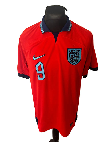 England 2022-23 away football shirt, red, Large, Nike, Harry Kane, front